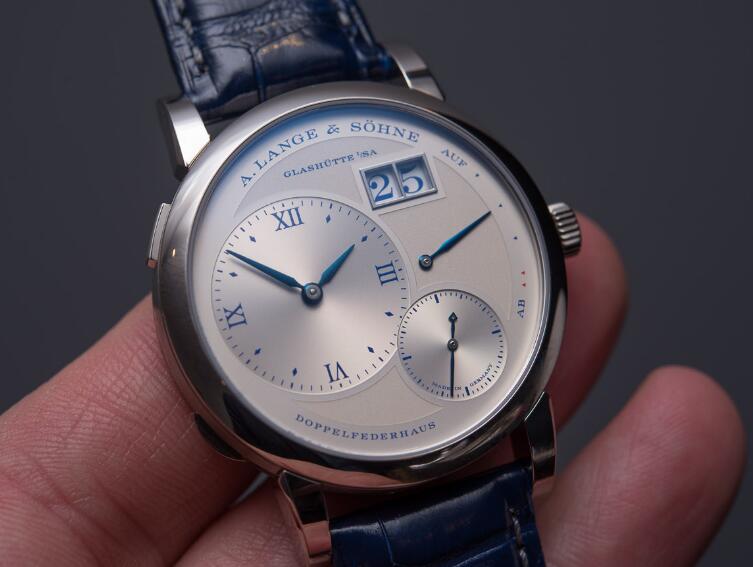 Swiss knock-off watches online are indicated with blue Roman numerals and blue hands.